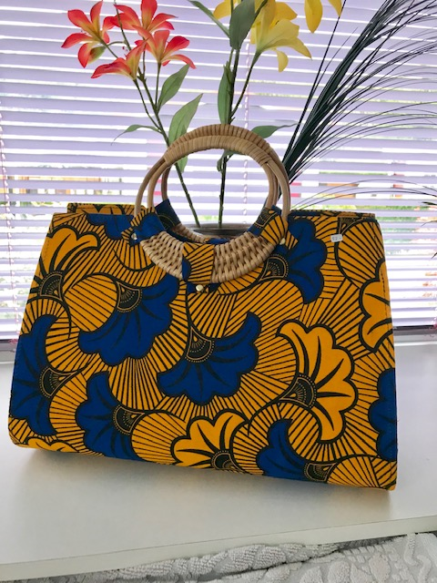 Sac wax Pochette tissu africain orange et turquoise tissu éthnique africain idée cadeau femme 